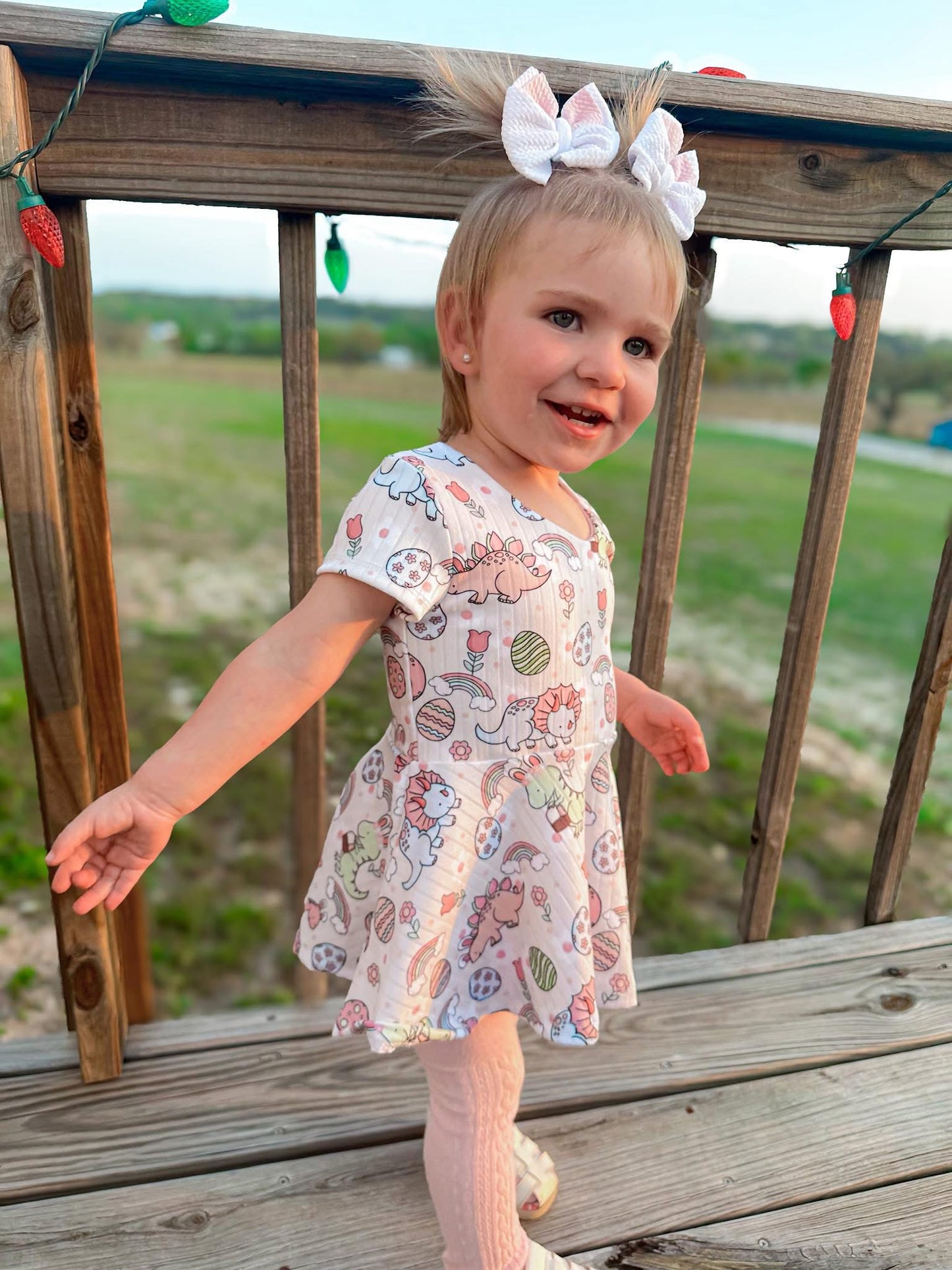 ARIA BOW BACK PEPLUM